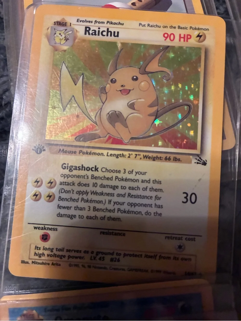 Pokemon Trading Card Lot - Assorted Colors 1997-98 trading cards in plastic hold